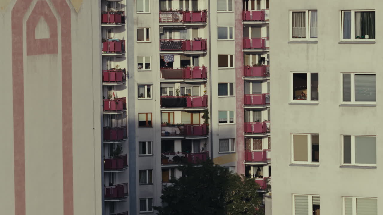 Multi-story apartment building with balconies