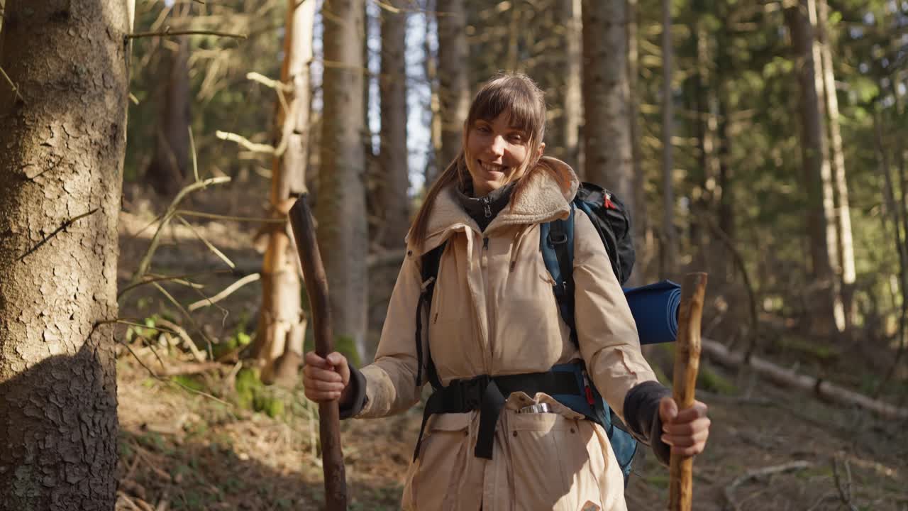 A woman hiking in a forest