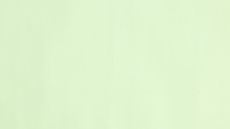 Wooden colorful sticks appear and making hello word on pastel green background. Stop motion flat lay
