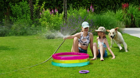 kids and dog having fun in the garden