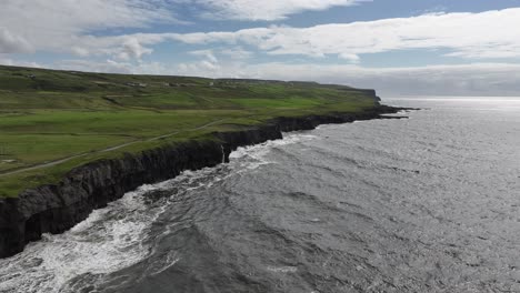 Aerial-shot-of-Cliffs-Meeting-Ocean