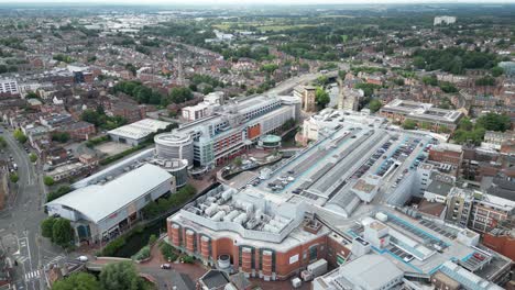 High-angle-aerial-Oracle-shopping-centre-Reading-town-in-background-Berkshire-UK