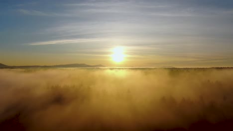 4k drone flight above the clouds during the golden hour