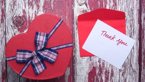 thank you note with heart-shaped gift box