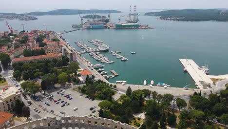 Pula,-Croatia:-Aerial-bird's-eye-view-over-Roman-Arena-in-Pula,-Istria,-Croatia