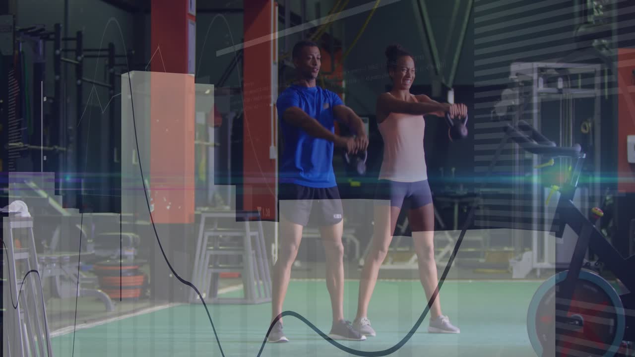 Male and female pair hinging hips, doing kettlebell swings for fitness with overlays showing motion