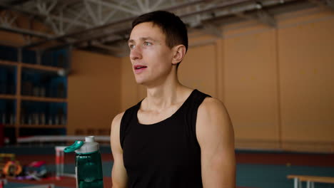 Young-man-drinking-water