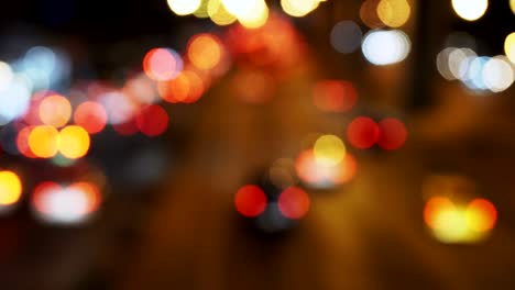 imagen de fondo desfocalizando el coche de luz por la noche. 4k