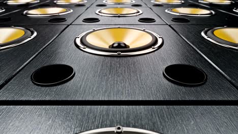 moving forward over audio speakers with yellow membranes playing modern music