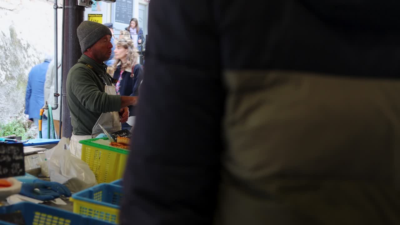 Seafood Vendors At Food Market Le Marché Provençal In Antibes, France. Static Shot