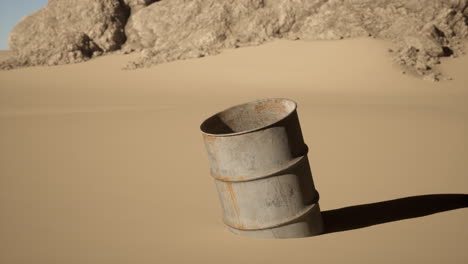 rusty barrel in a desert landscape