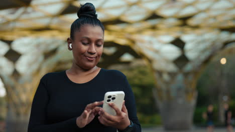 woman using mobile phone outdoors
