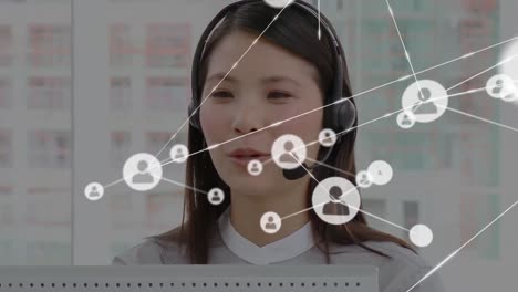 Animation-of-network-of-connections-and-icons-over-businesswoman-wearing-headset