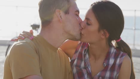 young adult couple relaxing at the seaside