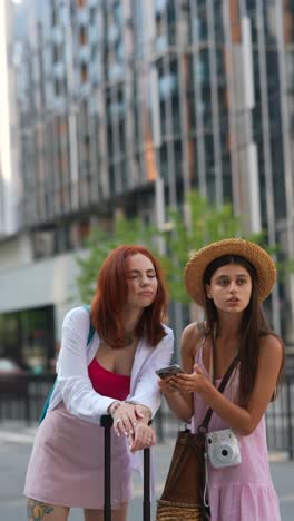 two women sightseeing in a city