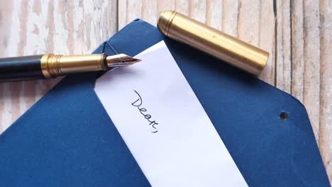 vintage fountain pen and handwritten letter