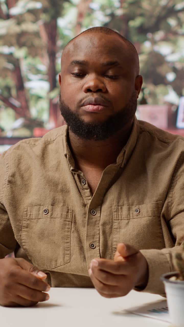 African American Man Talking and Gesturing to Camera