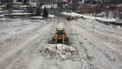 snow plow, plowing in north america after a big winter storm