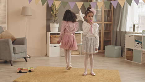 sisters performing talents at home
