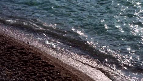 close up shot of waves rolling up white sand beach - stock video