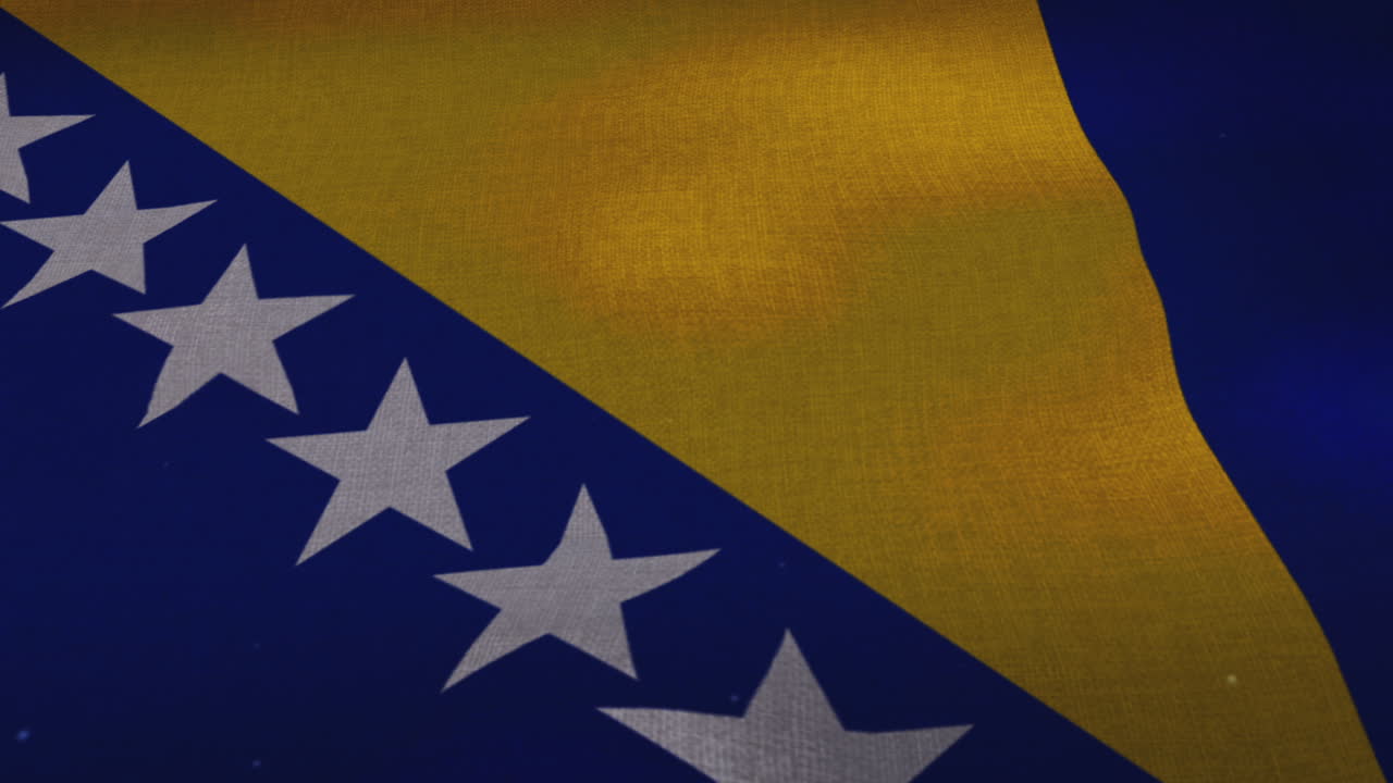 la bandera nacional de bosnia y herzegovina ondeando