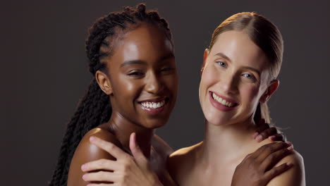 two beautiful women smiling together