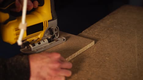 using a jigsaw to cut wood