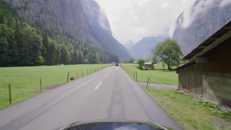 driving in the swiss alps from the famous grindelwald to lauterbrunnen in the rain