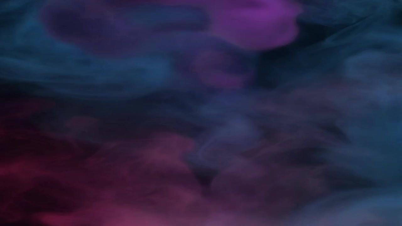 Abstract Pink and Blue Smoke Swirling Against a Black Background