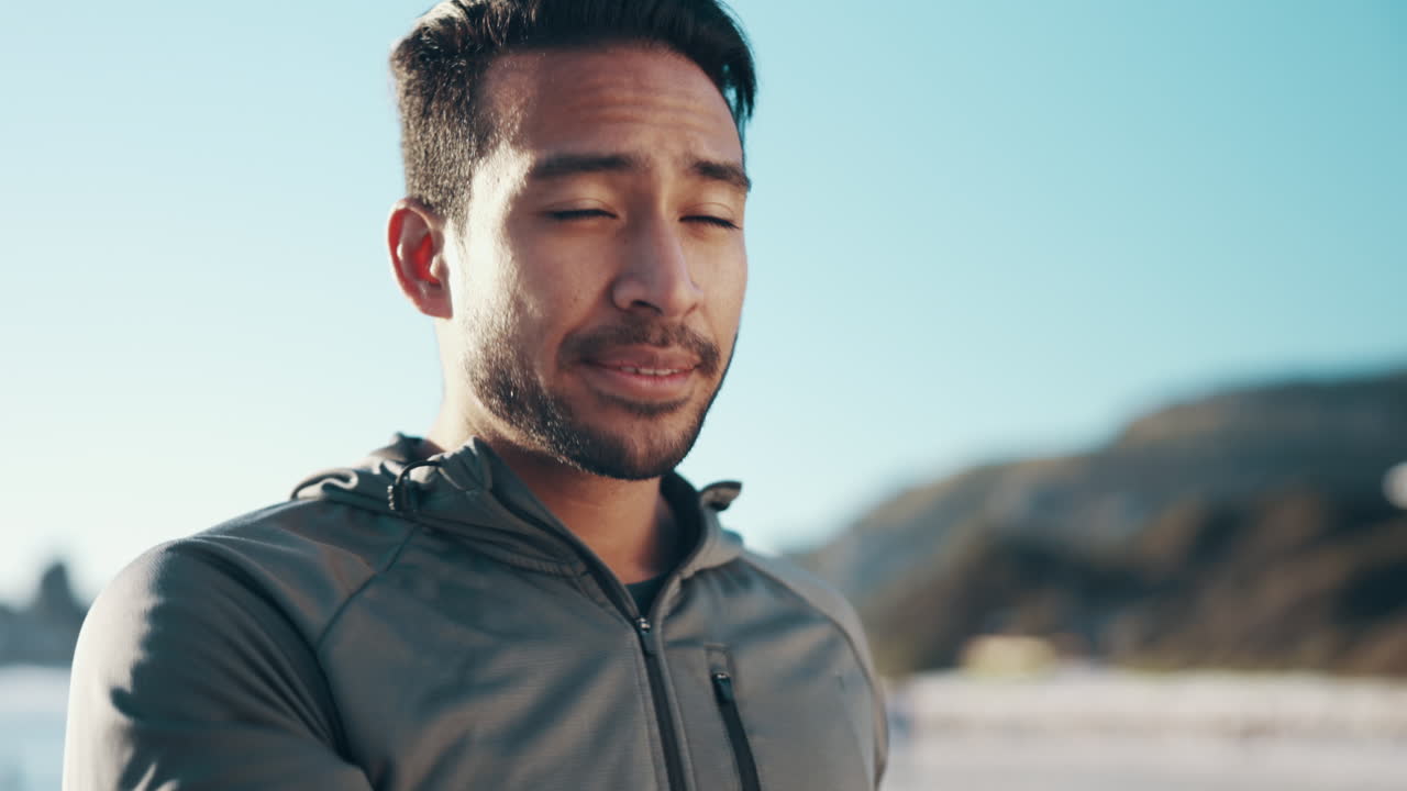 Beach, exercise and man drinking water
