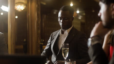 man playing poker at the casino.