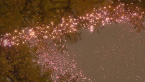 animación de estrella fugaz y estrellas cayendo sobre un árbol sobre un fondo marrón