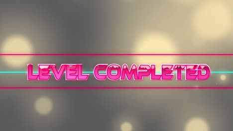 animation of level completed text over light spots on black background