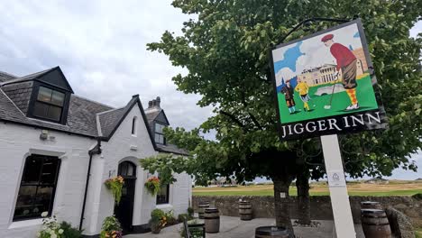 charming inn sign near historic building