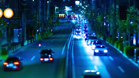 a night timelapse of the miniature traffic jam at the downtown street in tokyo