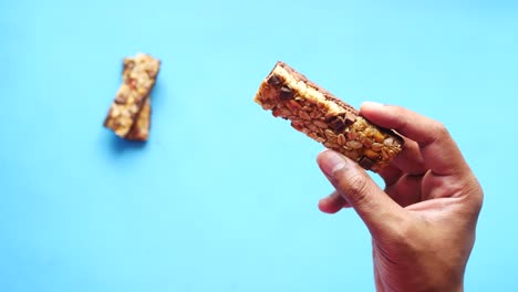 hand holding granola bars