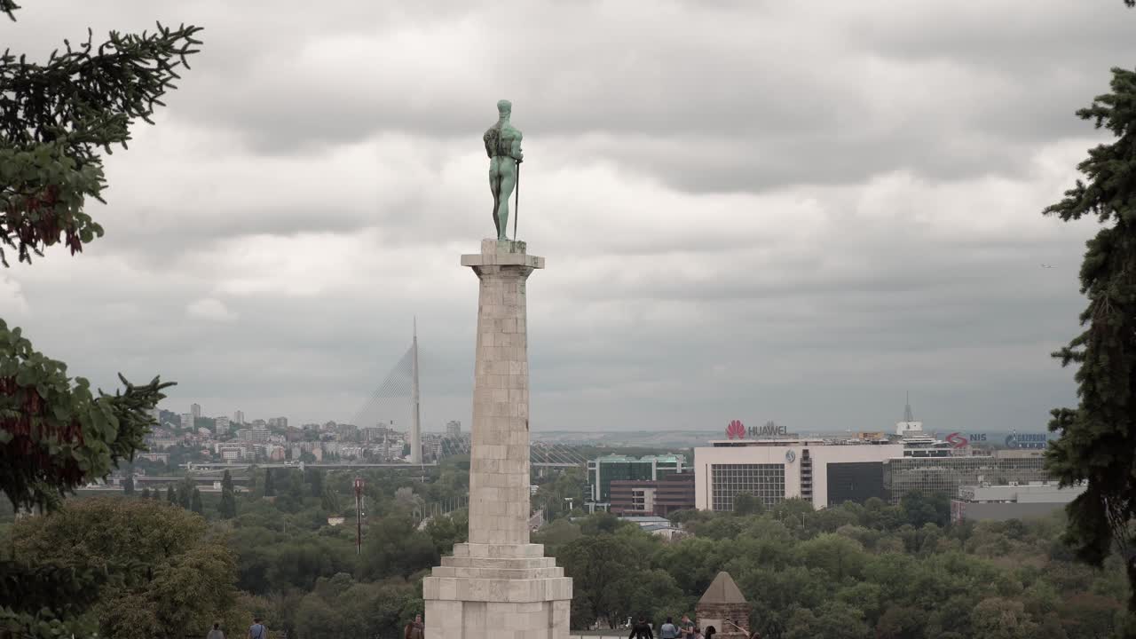 Tourists walking to Pobednik statue at the fortress in Belgrade, Serbia