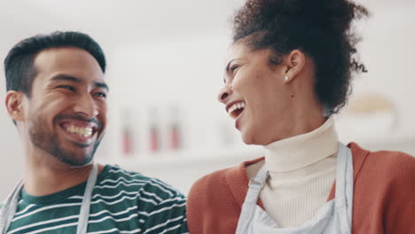 happy couple, cooking and laughing at joke
