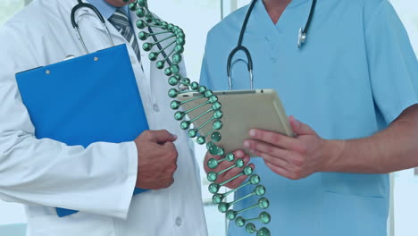 animation of dna strand spinning over doctors using tablet