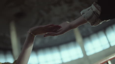 two hands reaching out and touching