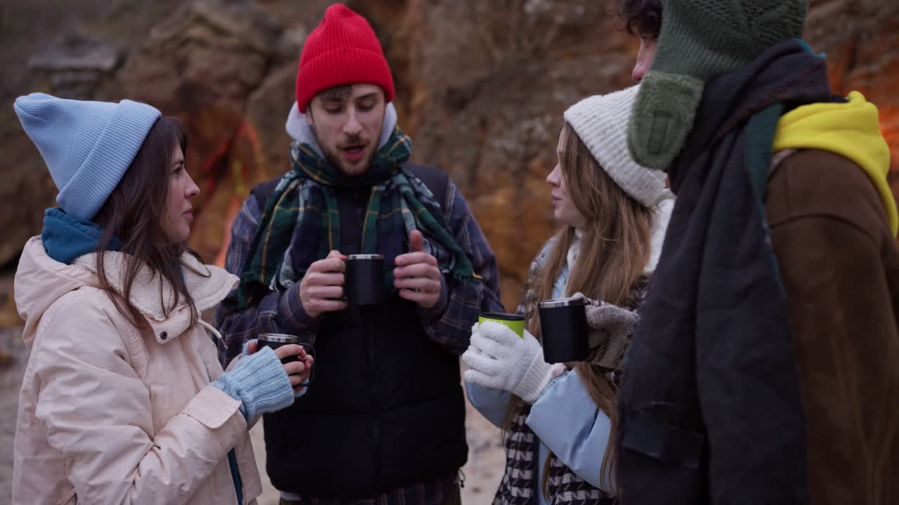 Friends Enjoying Hot Drinks Outdoors