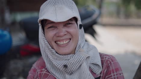 smiling woman in protective gear