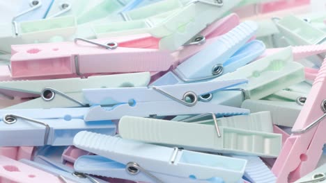 a pile of colored clothespins of delicate colors rotates in a circle a pile of colored clothespins of delicate colors rotates in a circle household items clothespins
