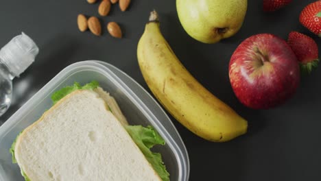 video of healthy packed lunch of fruit and vegetables