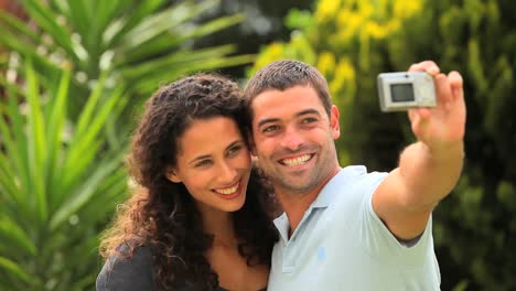 Young-couple-taking-picture-of-themselves