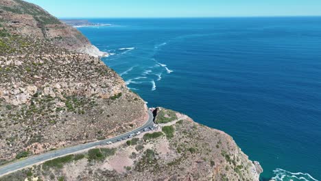 Aerial view of Chapman&#039;s Peak Drive, a stunning 9km winding coastal road between Hout Bay and Noordhoek with breathtaking Atlantic Ocean and cliff views