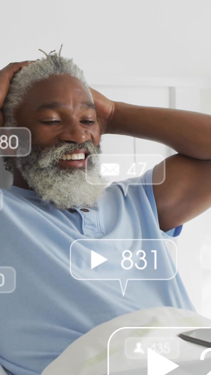 Animation of social media data processing over african american man using laptop