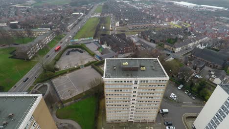 aerial footage view of high rise tower blocks, flats built in the city of stoke on trent to accommodate the increasing population, council housing crisis