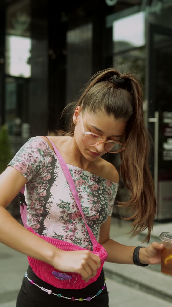 Young woman in city cafe