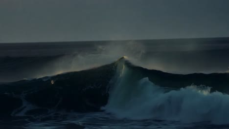 powerful ocean waves at sunrise/sunset